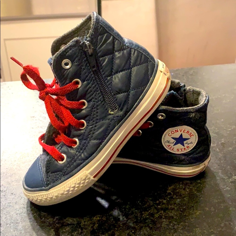 Kids Navy blue Chuck Taylor high tops by Converse